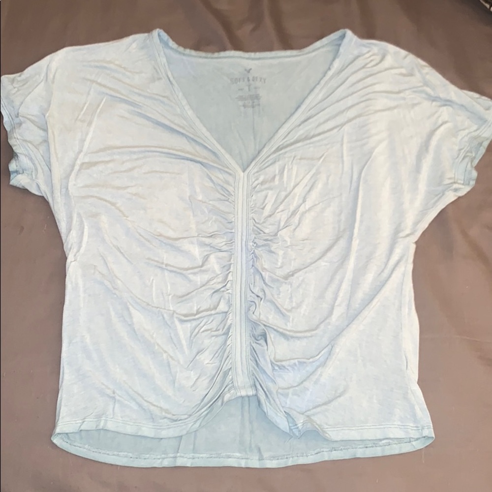 Light blue American eagle top.